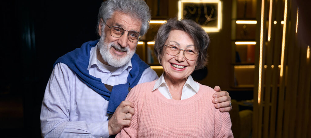 Couple purchasing theater tickets