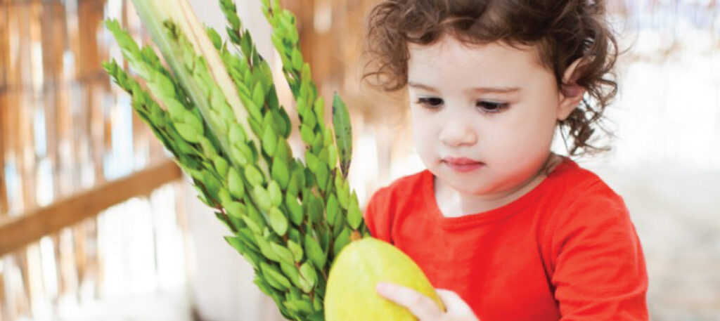 May contain a person holding green leaves and a yellow fruit.